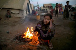 Rohingya Woman by a Fire