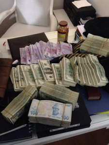 Thousands of dollars and euros found stashed in safes in the home of a Turkish minister’s son 