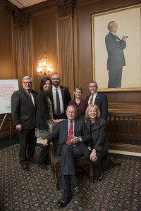 The Honorable William Webster seated with (L-to-R) Thomas Stipanowich, Sky Yancey Stipanowich, Patrick Simmons, the Honorable Beth Robb, Alan Sender, and Lynda Webster (kneeling).